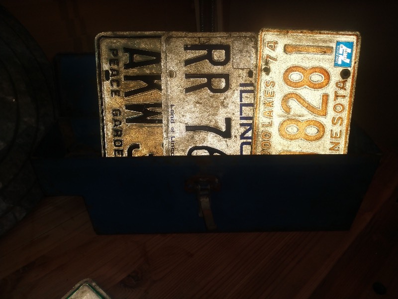 lot 127 image: Two Vintage Galvanized Garbage Can Lids, Vintage Blue Toolbox and Vintage License Plates