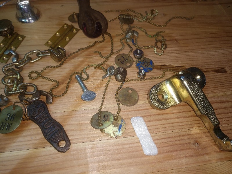 lot 148 image: Lot of Vintage Chains, Cow Tags, and Knick Knacks
