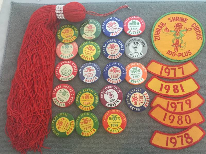 lot 262 image: Zuhrah Shrine Circus Patches, Pinbacks, Fez Tassle