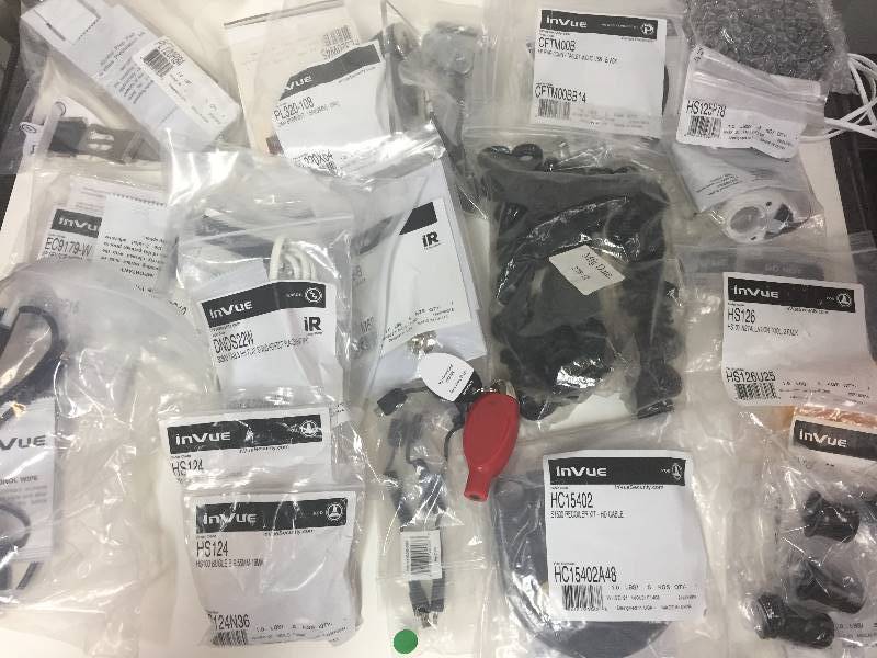 lot 319 image: InVue Connectors, Recoiler Kit, Cam Locks, Pucks, More