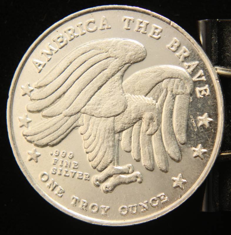 lot 34 image: 1 TROY OZ. .999 FINE SILVER WALKING LIBERTY DESIGN