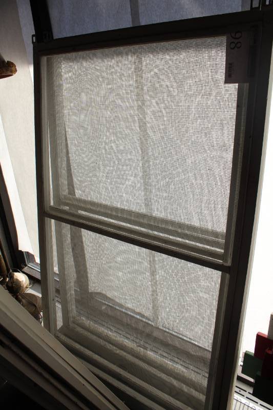 lot 98 image: House Window Screens with Mounting Hardware