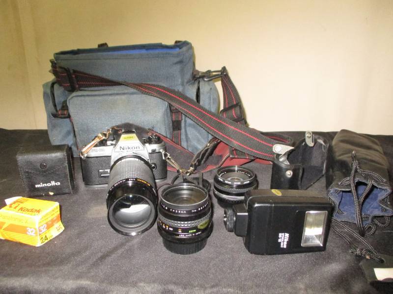 lot 16 image: Nikon FG-20 Camera and all the extra lenses and accessories