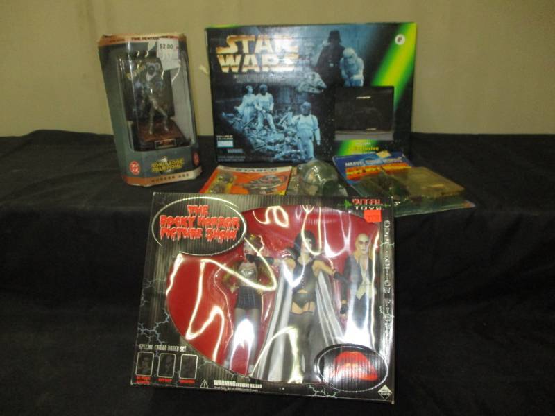lot 20 image: Star Wars Game, The Rockey Horror Picture Show Figurines, Comic Book Champions, Marvel Super Heros and more