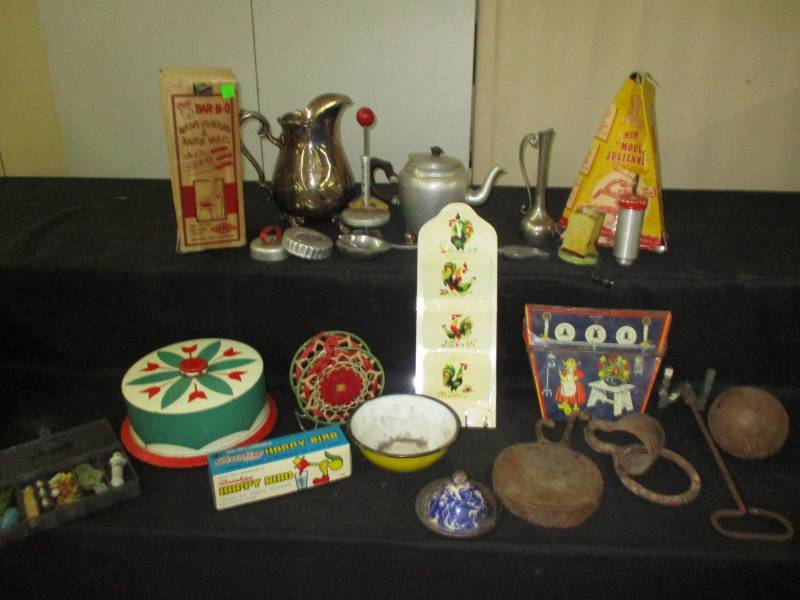 lot 51 image: Vintage items, branding iron, basing stuff, cookie cutters, happy bird, cake holder, letter holders, cannon ball and motre
