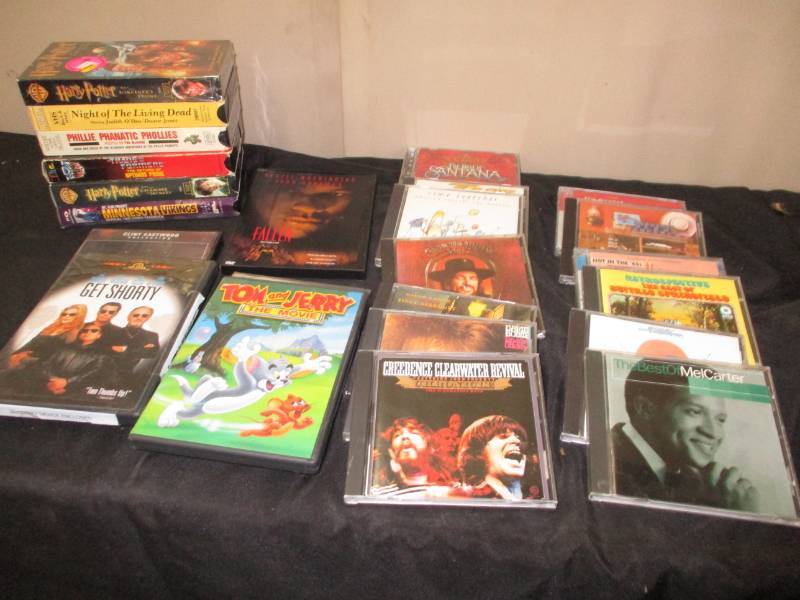 lot 61 image: VHS Tapes, DVDs and cds