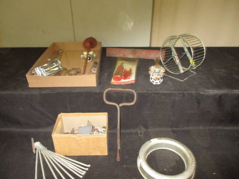 lot 69 image: Brass faucets and nozzels, Bail fork, sprinkler, level and more