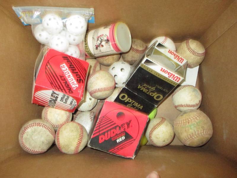 lot 71 image: Softballs unused in boxes, baseballs birdies and more