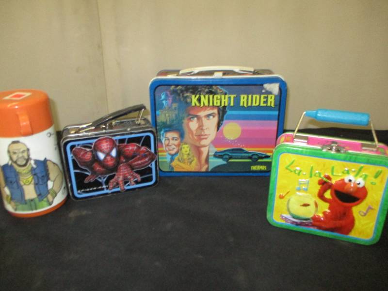 lot 75 image: Knight Rider lunch box, Mr. T Thermos , elmo and spiderman lunch boxes