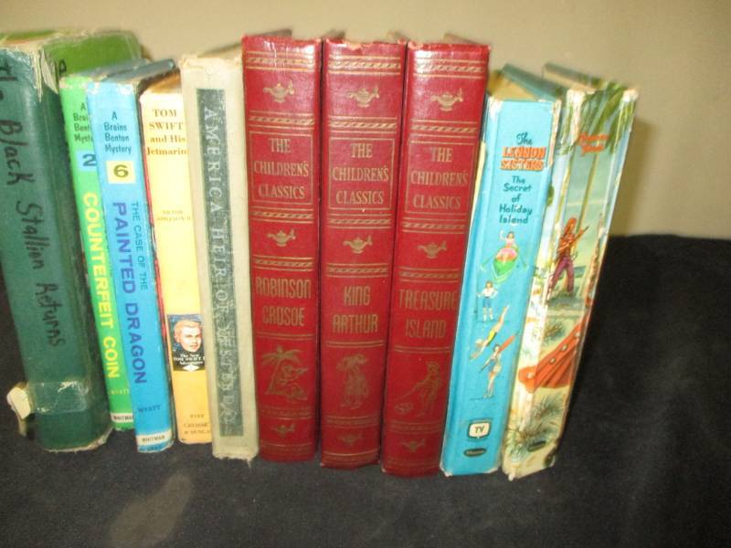 lot 77 image: C.S Lewis and Tom Swift Old hard cover books