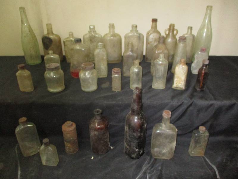 lot 85 image: Antique old bottles great for decorating with