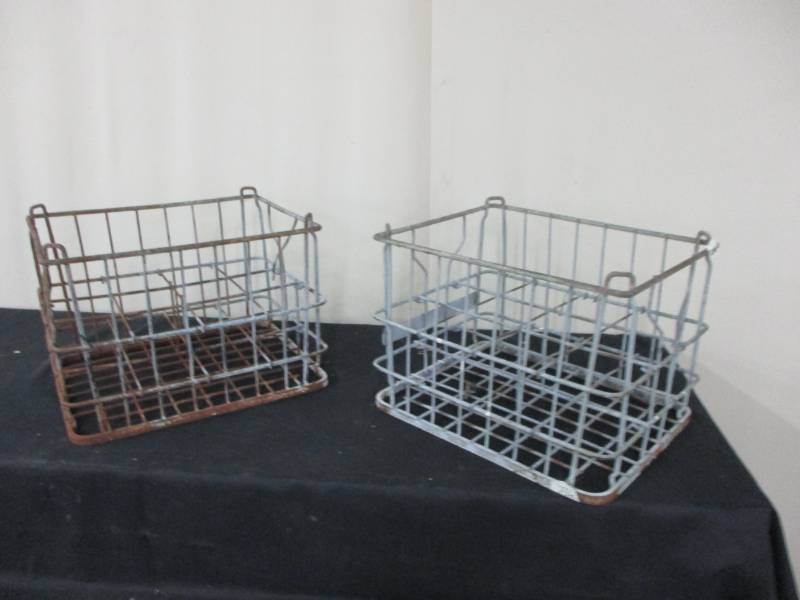 lot 98 image: 2 Old Metal Milk Crates