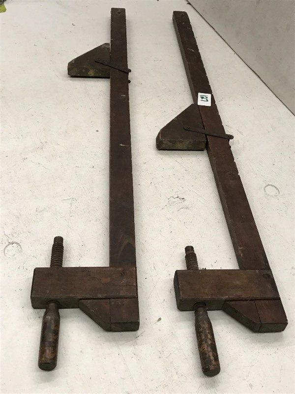 lot 127 image: (2) Antique Wooden Bar Clamps