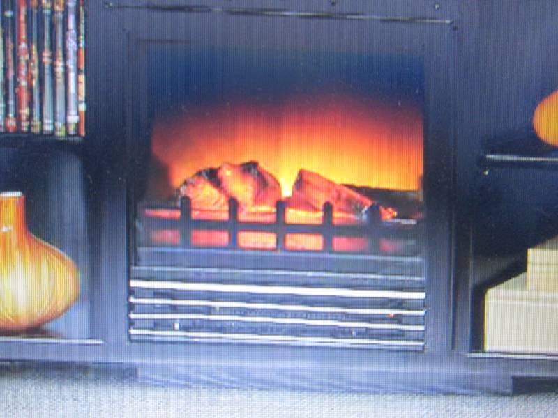 lot 28 image: Electric Fireplace Insert only , op...