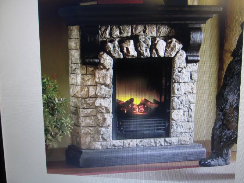 lot 45 image: Faux Stone Fireplace open box, unte...