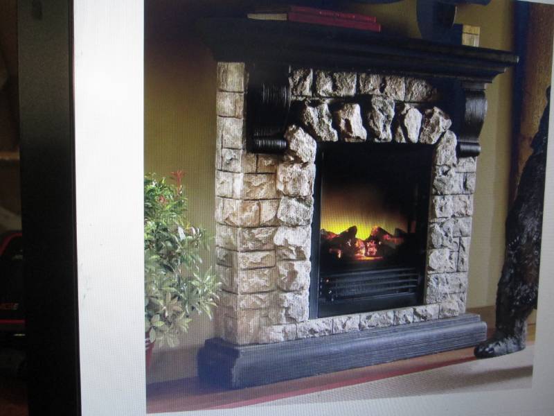 lot 52 image: Faux Stone Fireplace open box, unte...