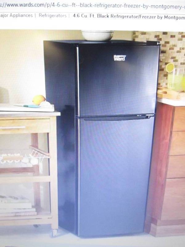 lot 53 image: 4.6 Cu. Ft. Black RefrigeratorFree...