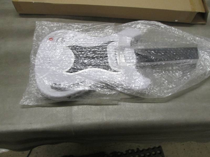 lot 131 image: Electric Touch Pad Guitar open box,...