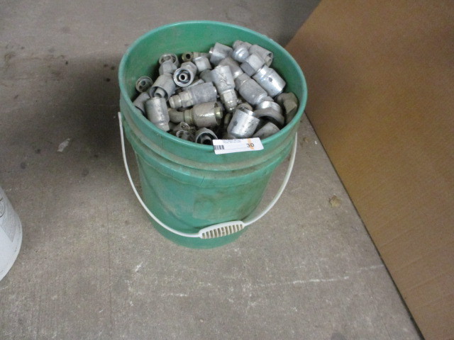 Pail full of new Hydraulic fittings