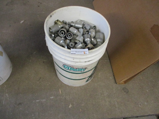 Pail full of new Hydraulic fittings