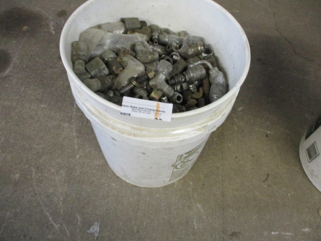 Pail full of new Hydraulic fittings