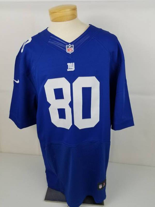 lot 36 image: On field NFL Reebox Blue New York Giants #80 Victor Cruz Football Jersey size 52