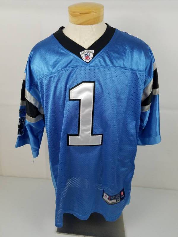 lot 37 image: On field NFL Reebox Blue #1 Caroline Panthers Cam Newton Football Jersey size 54