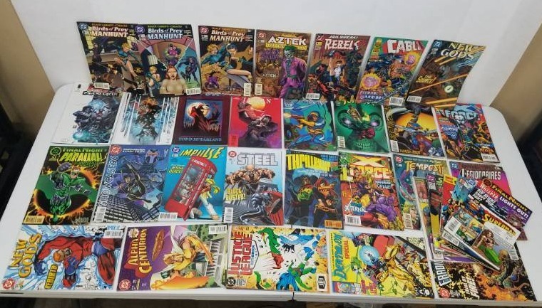 lot 60 image: Huge lot of 33 comics and 1 Spawn Trade Paper Back Comics from 1990s