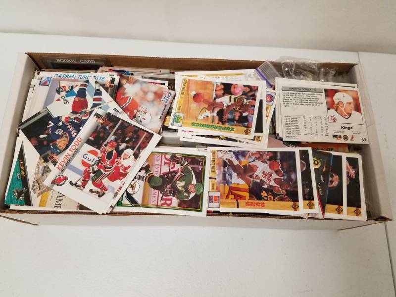 lot 73 image: 8 pounds of Hockey, Baseball, Basketball cards