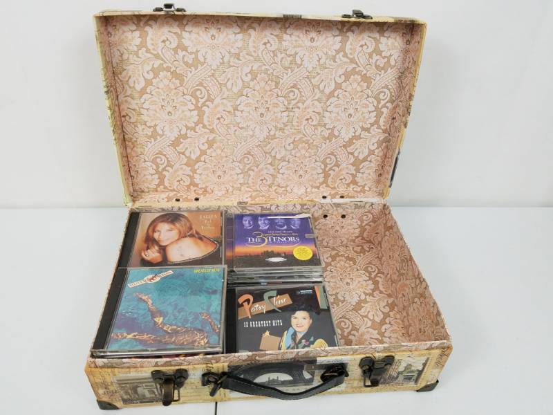 lot 98 image: 33 CDs and suite case