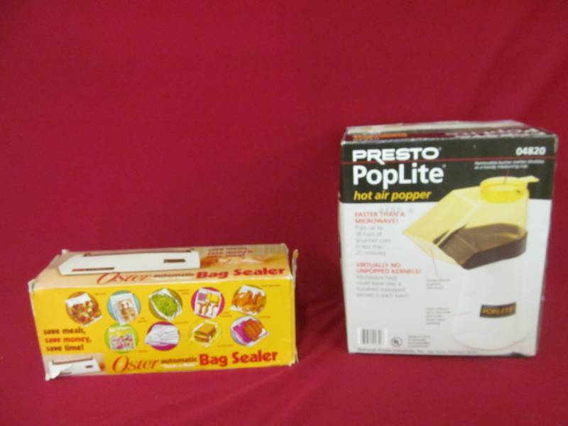 lot 33 image: Presto corn popper, Oster bag sealer