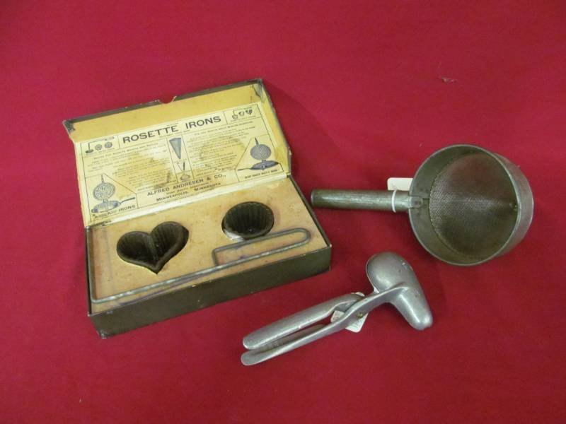 lot 112 image: vintage milk strainer, candy mold, rosette mold