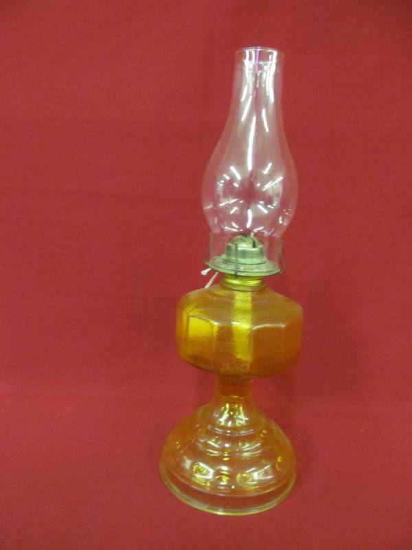 lot 131 image: gold oil lamp