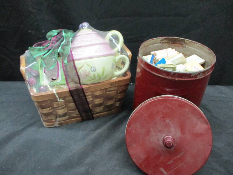 lot 100 image: Teapot and tea gift basket and old tin full of soap bars