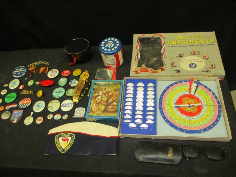 lot 103 image: Stetson hat, lots of old election pins, President game, old tin and more