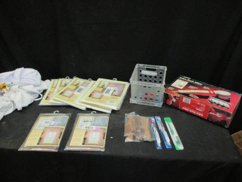 lot 125 image: Curtaines, Aprons, toothbrushes, massager, and more
