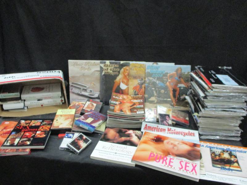 lot 134 image: PLAYBOY LOT, Playboy magazines, Sex Books, Erotica books on tape, Calandars Most of the Magazines are still sealed,