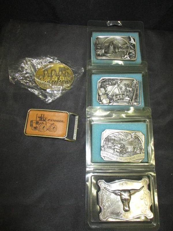 lot 146 image: Belt Buckles, tribute to the Indians, a camping one and religious one, plus steiger and more