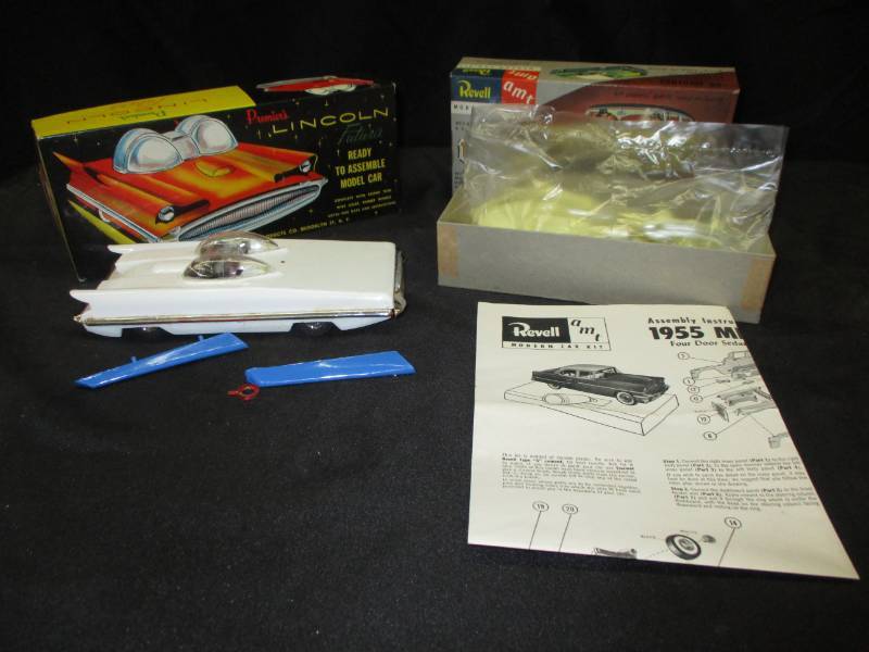 lot 169 image: 1955 Mercury Model car still in the plastic in the box. Lincoln Futura see pics for this is all the pieces here