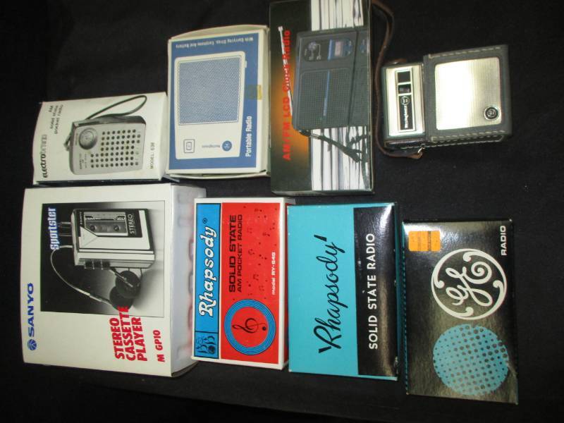 lot 171 image: Old pocket Radios in the box, all look unused but 1