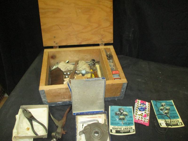 lot 180 image: Craftman Molding Head for bench saw and all the blade changes in a wood box full of other tools