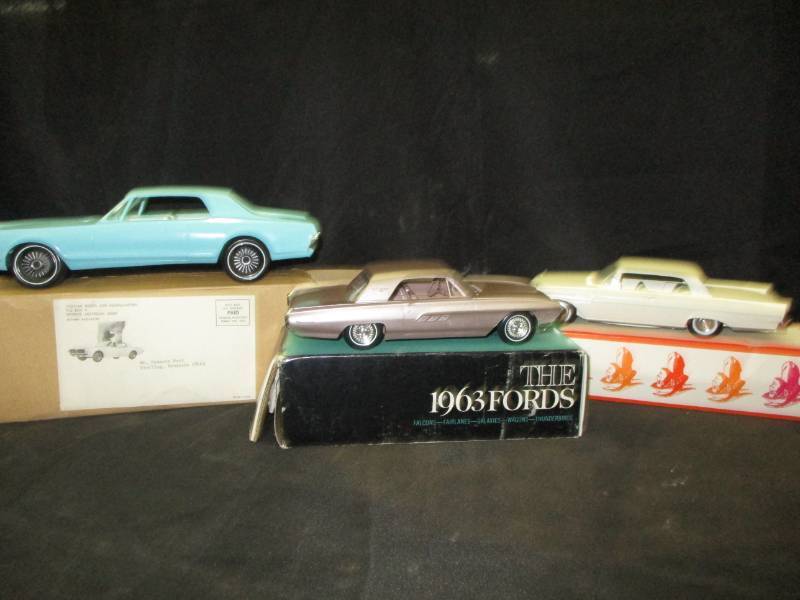 lot 164 image: Cougar Model Cars Car with box it came in, looks like mint condition, 1963 Fords  The Worlds Most contaigious roof line  Still in the box, Mercury Model Car in the box
