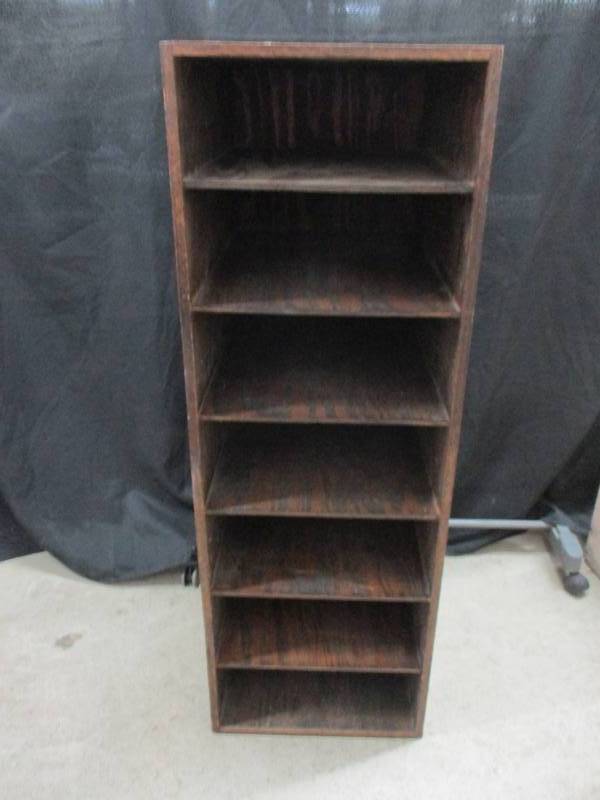lot 11 image: Shelf with 7 shelves like a record shelf 14 12 x 20 12 x 42 12