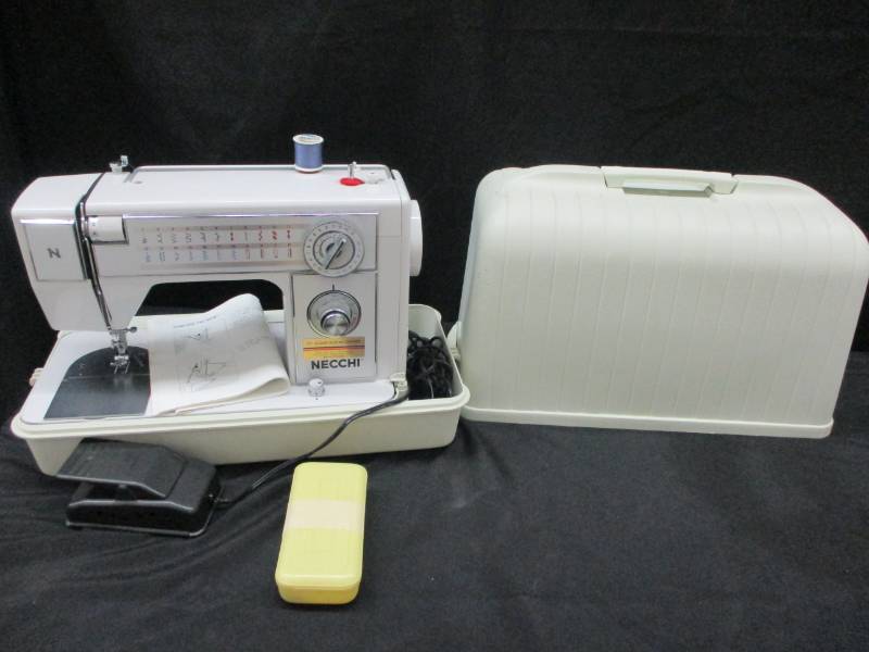 lot 67 image: Necchi Sewing Machine in case, it works and is in good clean condition