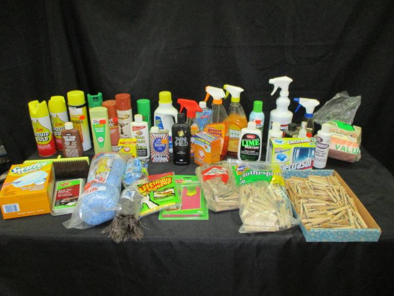 lot 77 image: Cleaning and poilishing supllies, Goo Gone, Clothe pins, Carpet cleaners, and more