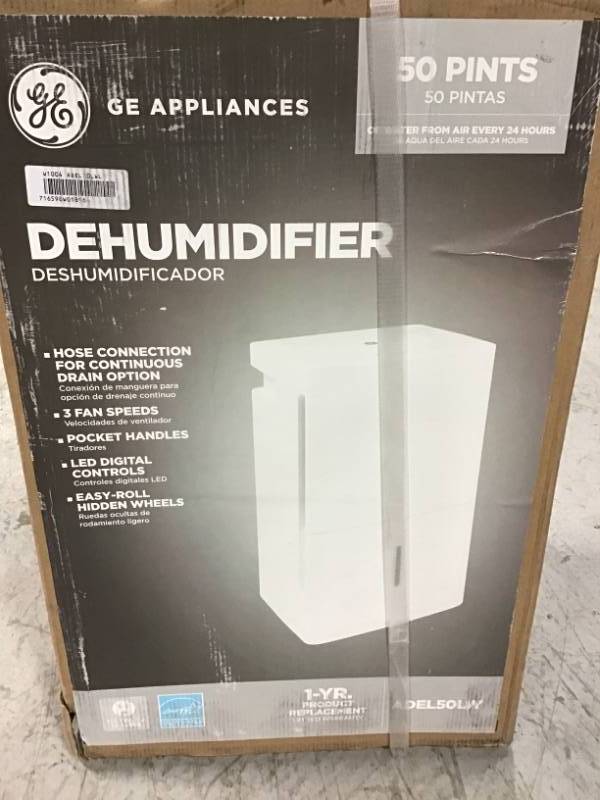 lot 69 image: GE 50 pt. Dehumidifier, open box in like new condition