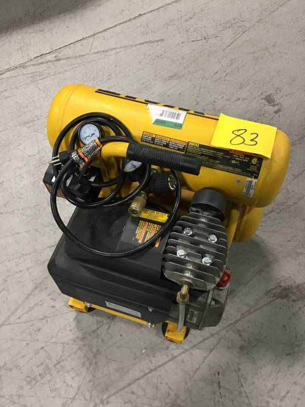 lot 83 image: DEWALT 4 Gal. Portable Electric Air Compressor in very good condition