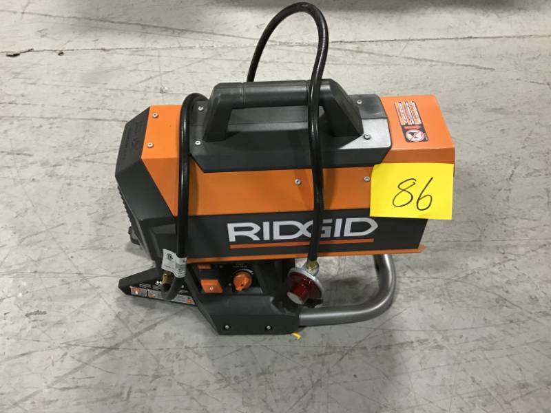 lot 86 image: RIDGID 18-Volt 60K BTU Hybrid Forced Air Propane Portable Heater open box in like new condition