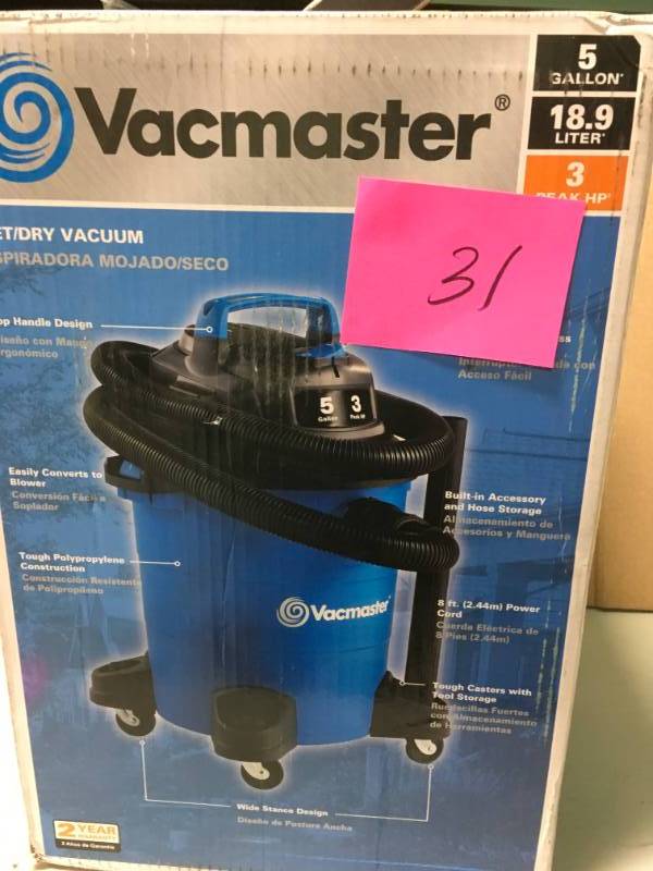 lot 31 image: Vacmaster 5 Gal. WetDry Vacuum open box in like new condition
