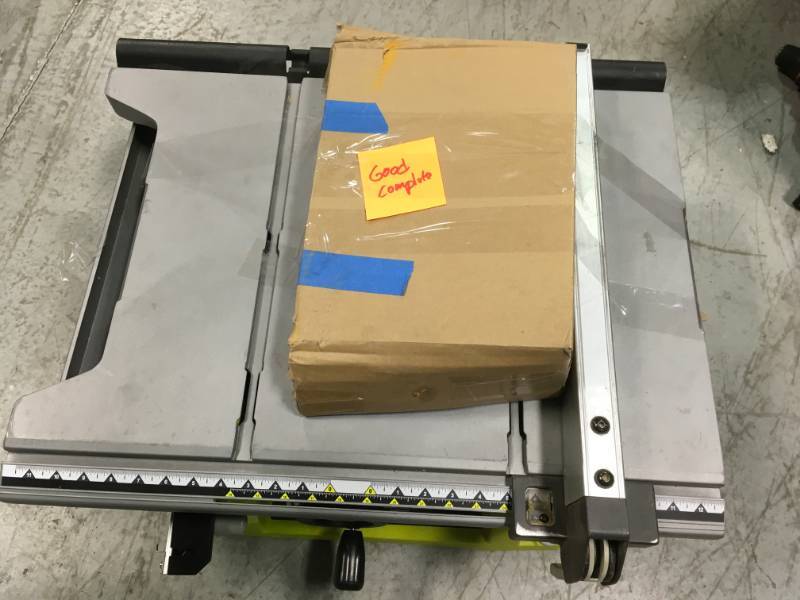lot 32 image: 10 IN. PORTABLE TABLE SAW WITH QUICKSTAND MODEL #RTS21G open box in like new condition